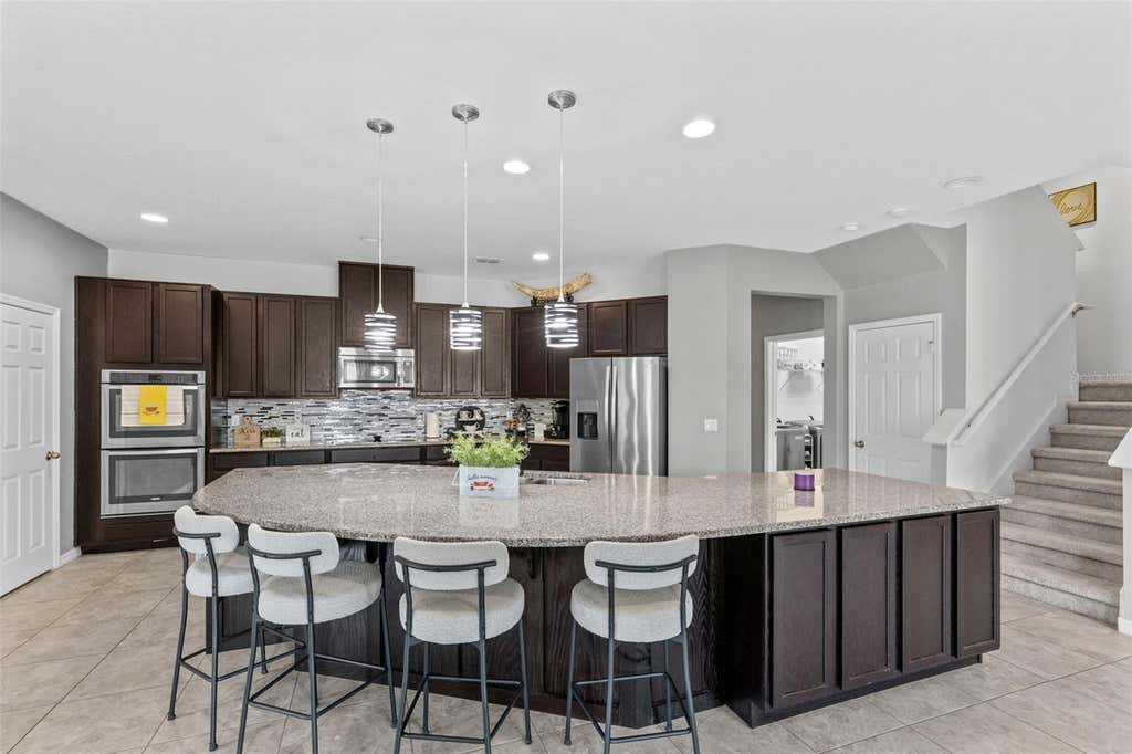 Photo of 1553 Pine Marsh Loop, Saint Cloud, FL 34771 (MLS # O6436266)
