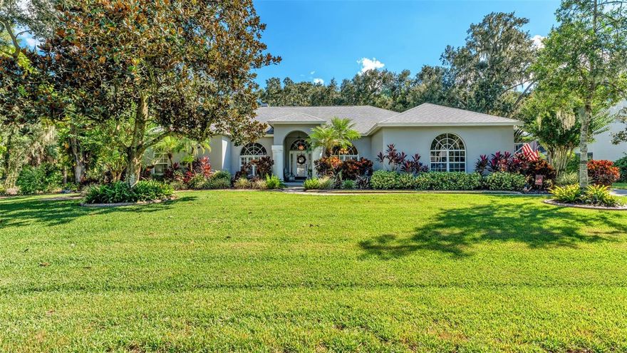 Elegant Pool Home – Designed for everyday comfort and effortless entertaining.

Set on 2.3 acres, this 3-bedroom, 3-bathroom home feels like a private retreat — full of warmth, space, and thoughtful details that make everyday life easier and more enjoyable.

The landscaped front yard and extra-long driveway wrapping to the two-car garage give a warm first impression. A glass front door opens into a spacious foyer, leading into an open layout with high ceilings and plenty of natural light.

At the front of the home, the formal dining room features crown molding and an arched window with plantation shutters. Just beyond, the cozy family room centers around a fireplace and opens to the pool patio through French doors. The kitchen connects seamlessly, with stone counters, stainless steel appliances, a built-in oven and microwave, a walk-in pantry with frosted glass door, and a window over the sink. A breakfast nook just off the kitchen also opens to the pool area, making indoor-outdoor living feel effortless.

The split-bedroom layout adds privacy, with a large primary suite featuring wood floors, sliding glass doors, and access to its own screened-in porch — a quiet spot to enjoy your morning coffee or unwind in the evening. The en-suite bath includes a walk-in closet at the entrance, double sinks, a walk-in shower, and a handicap-accessible soaking tub surrounded by windows that fill the space with natural light.

The oversized and flexible layout of the guest bedroom makes it easy to use as a bedroom, with extra space that you can use to create a reading nook or a creative space. The room has plenty of storage with three double closets! The third bedroom stands out with a striking wood-accent wall that adds warmth and character, giving the space a cozy, lived-in feel.

Working from home? The private office is complete with custom-built-in shelving, a glass door for quiet focus, and a beautiful arched window with plantation shutters that bring in soft natural light and timeless character.

Nearby, the guest bathroom features a tiled walk-in shower and a modern vanity, creating a clean and comfortable space for everyday use. The full pool bathroom adds extra convenience with stone countertops, dual sinks, a tub/shower combo, and direct access to the pool area—perfect for guests or busy days outdoors. The laundry room is equally practical, with a utility sink, built-in shelving, and extra cabinetry to keep everything organized and within reach.

Step outside to a fully enclosed pool area with ceiling fans, lounge space, and two patios — one with pavers and a wooden swing, the other perfect for a storage area. The backyard is fully fenced, giving it a sense of privacy and calm.

This gated community is near Peterson Park, grocery stores, and local dining, just minutes away. You’re close to everything while still enjoying a tucked-away feel.

If you’re looking for a comfortable, well-cared-for home with great outdoor space, this one is ready when you are. Come take a look.
