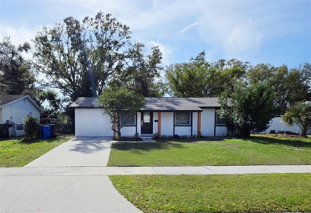 Photo of 9009 Tree Valley Circle, Tampa, FL 33615 (MLS # TB8463952)