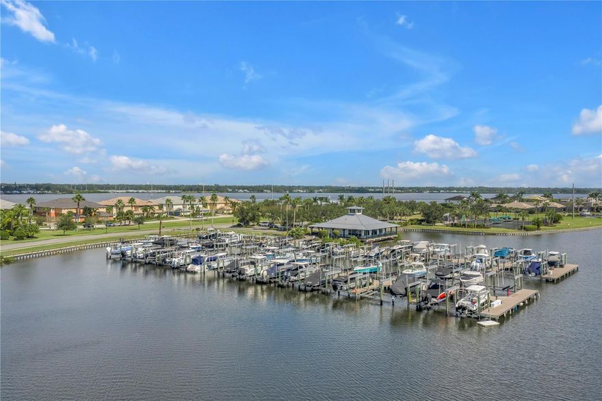 One or more photo(s) has been virtually staged. WATERFRONT LIVING IN A TRUE MARINA COMMUNITY—welcome to Tidewater Preserve, where every day begins with shimmering Manatee River water views and ends with golden, unforgettable sunset skies. This is the boating lifestyle you’ve been waiting for: a private, gated enclave designed around the water, the marina, and the kind of effortless luxury that feels like vacation… every single day.

Inside this beautifully appointed Birkdale model condo, the details feel intentional and elevated—tile flooring laid on the diagonal, crown molding, sparkling quartz countertops, 42” cabinetry, and a massive entertainer’s island framed by designer lighting and a tasteful backsplash. It’s the kind of home that invites you to pour a glass of wine, exhale, and stay awhile. Slide open to the river-view lanai, your front-row seat to nature’s show—dolphins surfacing, manatees gliding, and eagles soaring overhead. Quiet mornings. Breathtaking evenings. A view that never gets old.

This home is also as smart as it is stunning, featuring Smart Home technology including an integrated door lock system, Ring doorbell, and thermostat—comfort, convenience, and peace of mind at your fingertips. You’ll also love the practical luxuries that matter: an assigned carport plus a large private storage closet, ideal for bikes, paddle gear, seasonal items, and beach days.

But Tidewater Preserve is where this property becomes truly one-of-a-kind. This is a boating community with a private marina and boat slip opportunities offering direct access to the Manatee River—perfect for sunset cruises, fishing, and weekend adventures on the water. When you’re not boating, you’re living the resort life: two clubhouses, three pools, two fitness centers, Har-Tru tennis courts, and a dedicated canoe & kayak launch/park with storage. Follow the riverfront nature trail and feel the world slow down in the best way.

With 24-hour gated security, impeccably maintained landscaping, and an on-site Lifestyle Director, this community is curated for ease, connection, and an elevated everyday rhythm. Built in 2019, this condo offers the confidence buyers want—modest fees, no CDDs, fully funded reserves, and impressive included services: water, flood insurance, WiFi/internet, and cable—a value package that’s hard to find in waterfront Florida living.

This isn’t just a condo. It’s a waterfront statement—an address that says you’ve arrived, and a lifestyle that keeps you there.

Rare bonus opportunity: the neighboring unit (#406) is also available—an exceptional chance to own side-by-side residences for multi-generational living, a luxury guest retreat, or a high-end second-home pairing.