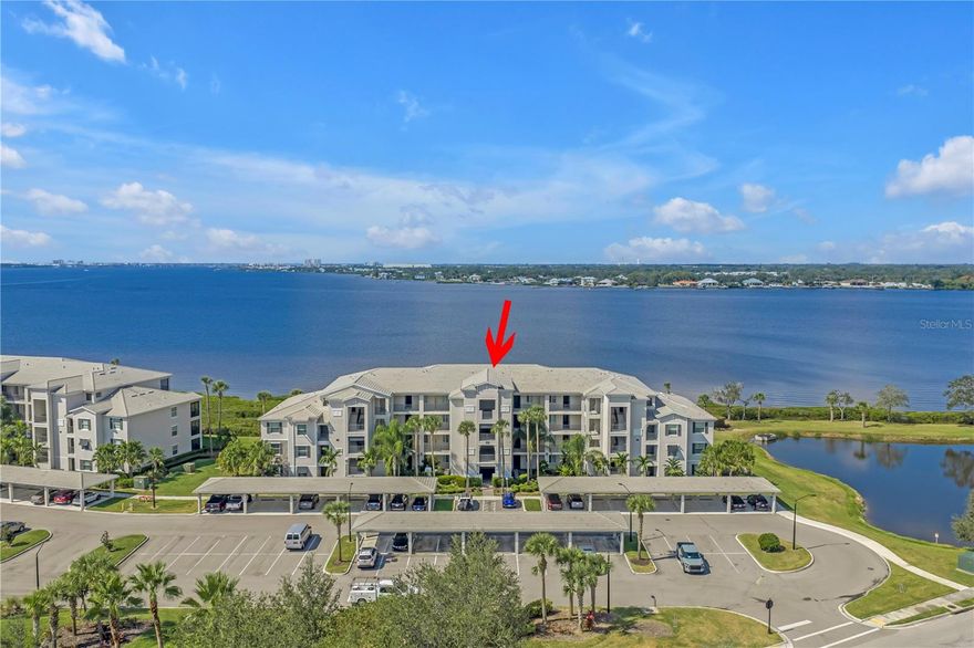 Experience the epitome of LUXURY LIFESTYLE with WATERFRONT living in this BOATING COMMUNITY within the esteemed Tidewater Preserve. The WATER VIEWS of the Manatee River and surrounding nature is a great way to start your day. End your day with AMAZING SUNSETS every evening. Inside you will be captivated by the exquisite details that adorn every corner of this Birkdale model home. This condo features TILE FLOORING on the diagonal, CROWN MOLDING, dazzling QUARTZ countertops, 42” cabinets, MASSIVE ISLAND, lighting fixtures, and backsplash. The LANIA provides the perfect spot to soak in the picturesque views of the majestic Manatee River with dolphin, manatee and eagle sightings.  This SMART HOME is equipped with state-of-the-art features, including an integrated door lock system, Ring doorbell, and thermostat, ensuring both convenience and security. In addition to the ASSIGNED CARPORT, you have a LARGE PRIVATE STORAGE CLOSET. Ideal for those seeking a second home, this condominium is immaculate, making it ready for immediate occupancy. Beyond the confines of this exquisite abode lies a wealth of amenities that cater to every lifestyle need. From the PRIVATE MARINA with BOAT SLIP opportunities that access the Manatee River to the TWO CLUBHOUSES, three POOLS, and two FITNESS CENTERS, every aspect of the Tidewater Preserve community is designed to enhance your quality of life. Outdoor enthusiasts will delight in the three Har-Tru TENNIS COURTS, CANOE and KAYAK park with storage, and NATURE TRAIL along the river, providing endless opportunities for recreation and relaxation. With 24-hour GATED SECURITY, meticulously maintained landscaping, and a dedicated LIFESTYLE DIRECTOR on-site, residents can enjoy peace of mind and unparalleled convenience. 2019 CONSTRUCTION with modest fees and no CDDs, FULLY FUNDED RESERVES, the association covers essential services such as water, flood insurance, WIFI/internet, and cable, further enhancing the value of this exceptional property. This is more than just a condominium—it's a lifestyle statement. Don't miss the chance to make it yours. Schedule your private showing today and experience the ultimate in waterfront living at Tidewater Preserve. New construction 2019 with fully funded reserves to meet requirements.  *** Neighboring Condo Unit #406 is also available for the unique opporuntity to own the neighboring unit***