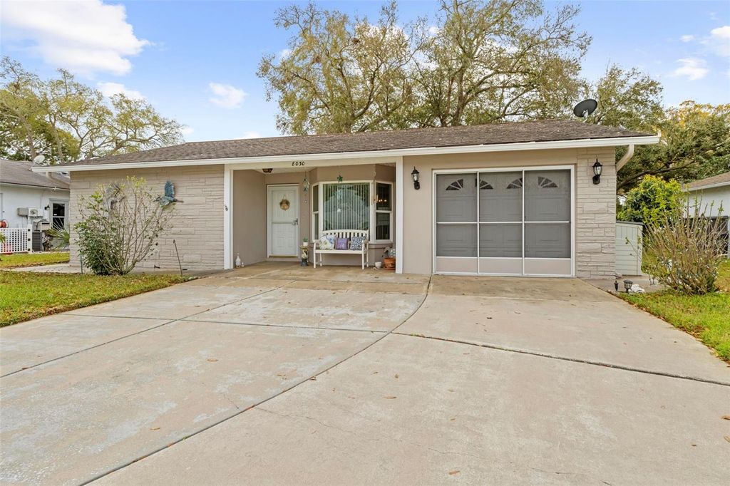 Photo of 8030 Gleneagle Drive, Port Richey, FL 34668 (MLS # W7883503)