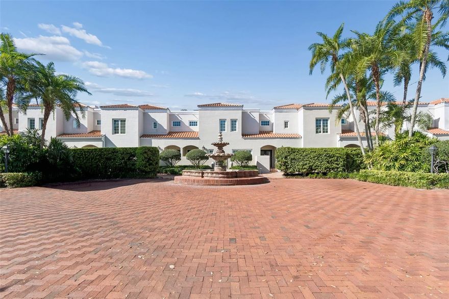 Calling all art collectors to view this fully renovated 3/3 townhouse-style condominium with 9- and 12-foot ceilings on the first floor and heavy crown mouldings to provide the perfect canvas to showcase your collection. Three sets of double-paned French doors with large transoms open from the breakfast and family rooms into a walled courtyard bringing abundant natural light and offering open access to a professionally landscaped and lighted private oasis for relaxing or entertaining. The two-story screen enclosure allows bug-free enjoyment and creates additional living space. Features include recently replaced double mahogany front doors with leaded glass; wide plank wood floors, a double-sided wood-burning fireplace; white wood cabinets, granite countertops, tiled backsplash, stainless steel appliances, and a walk-in pantry; mirrored wet bar; six skylights to allow generous natural light into the interior; custom created steel railings and banister; soaking tub, separate shower, and double sinks; large walk-in closets; French doors from the primary bedroom to a balcony overlooking the courtyard; and Speed Queen commercial washer and dryer. The floor plan is ideal for modern living with the wall removed between the kitchen and living room providing a very open feel. The first floor bedroom and full bath is currently used as an office but offers peace of mind by providing ground-floor accommodations. (The closet has been converted to built-in shelving but could be returned to closet space.) The secondary and primary bedrooms on the second floor each have a connecting bath and are separated by a  13' x 22' family room, offering additional living space and creating a split bedroom plan. 4951's location at the back of Adeste is a bonus, offering access from Pilgrim's Pathway to your two car garage. Your guests can arrive via the gated entrance with a Bayshore address to a lushly landscaped motor court anchored by a European style fountain. West Coast Management oversees the 17 unit, gated community which offers easy lock and leave living. There has been NO FLOODING in unit 4951 or the garage. The Ballast Point location across the street from townhomes fronting the Hillsborough Bay is ideal for enjoyment of Bayshore Boulevard's linear park and Ballast Point Park's interactive water feature and pier, two blocks south. Adeste's location offers an easy commute to Downtown Tampa in 5.8 miles, MacDill Air Force Base Bayshore gate in 2 miles, Tampa International Airport in  7.5 miles, and to the Pinellas beaches fronting the Gulf of America in 23 miles. Local restaurants and well-maintained parks are within walking distance. Call today to see this special home. All information is believed to be accurate but should be confirmed by Buyer. The $1,850 monthly condo fee includes insurance on the property, wind, and full limits of flood, as well as water, sewer, solid waste disposal, internet, basic cable, exterior and roof maintenance, including paint, and yard maintenance in both the courtyard and exterior grounds. Adeste offers well managed, lock and leave living. Call today for your tour!