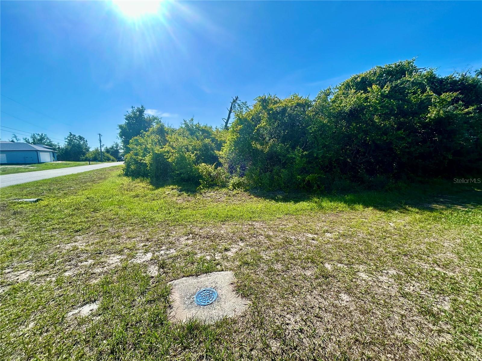 LOCATION! Buy now and build now or later - Vacant lot for sale in South Gulf Cove - Multi-Family - Medium Density Residential RMF-10 with water, sewer and electric available. This is a great sized lot at 120 x 80 ft with southern rear exposure and minutes away from beaches, shopping, Dining and Golf Courses, The lot is well placed within the community offering multiple parks, playground, sidewalks and a public boat ramp which is only 5 minutes away giving you access to miles of navigable waterways within the community leading to access to the Charlotte Harbor & the Gulf for all your boating adventures. South Gulf Cove is a voluntary deed restricted community with great amenities,, go take a look at this lot and imagine how you might make this your perfect new home.