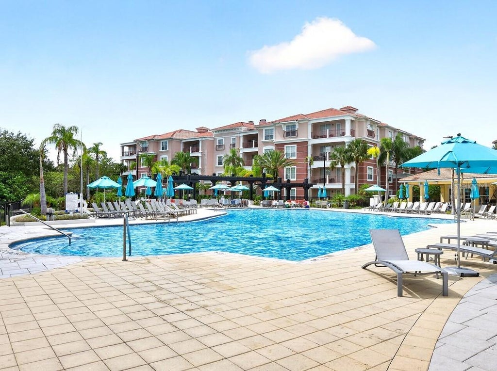 Photo of 5049 Shoreway Loop #1-201, Orlando, FL 32819 (MLS # O6443541)