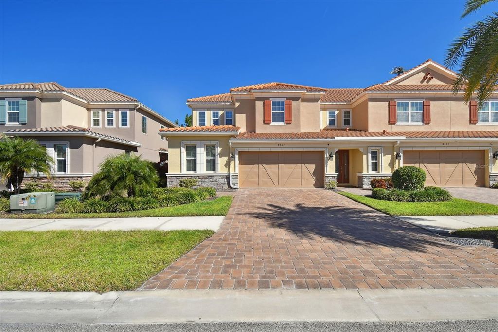 Photo of 8747 Terracina Lake Drive, Tampa, FL 33625 (MLS # TB8506104)