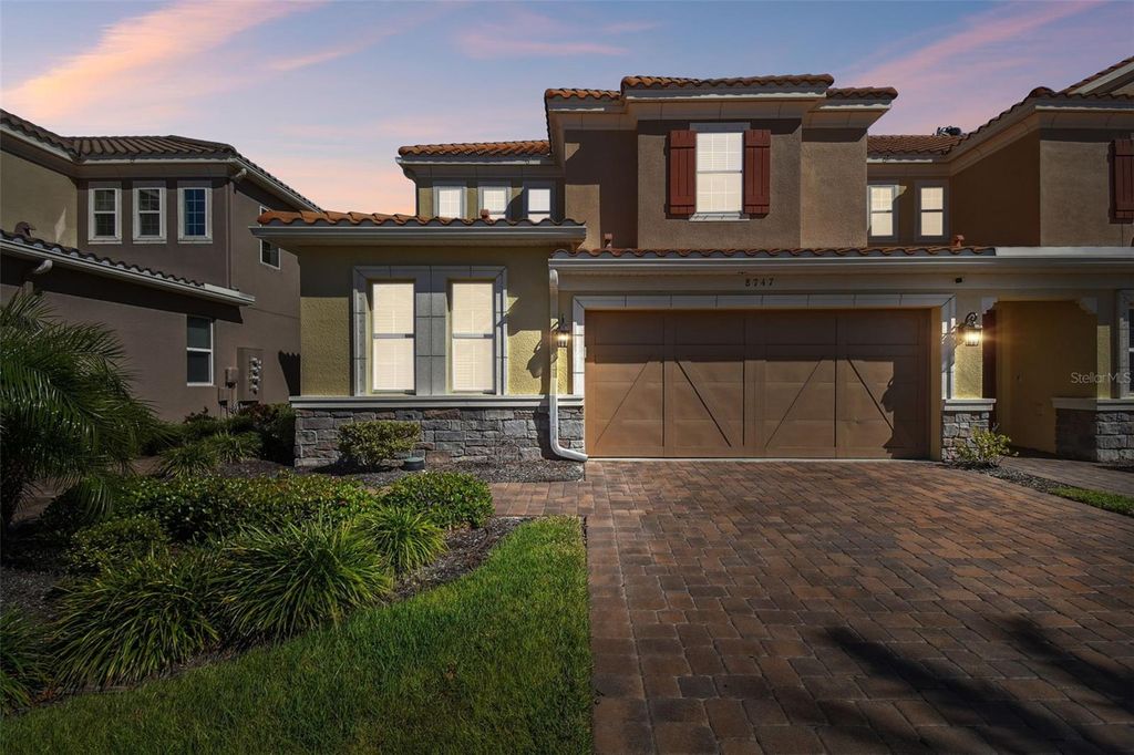 Photo of 8747 Terracina Lake Drive, Tampa, FL 33625 (MLS # TB8506104)