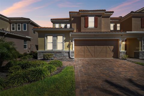 Photo of 8747 Terracina Lake Drive, Tampa, FL 33625 (MLS # TB8506104)