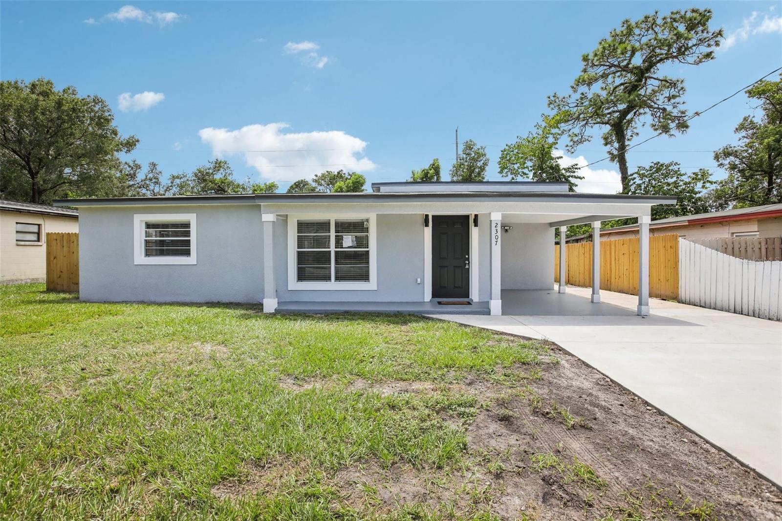 Welcome Home! This stunning 3 bedrooms- 2 bathrooms move-in ready home, has been updated from top to bottom, offering modern comfort, stylish finishes, and peace of mind with a newer roof and AC unit. Every detail of this home has been thoughtfully designed to create a space that’s both functional and striking. Step inside and immediately notice the gleaming new flooring that flows seamlessly throughout the home, setting the tone for a bright and inviting interior. The fully remodeled kitchen is a showstopper, featuring sleek countertops, contemporary cabinetry, and modern appliances that make cooking and entertaining a joy.The bathroom has also been fully updated, boasting clean lines, fresh fixtures, and a spa-like Rain shower ambiance that elevates daily routines into moments of relaxation. Coupled with the home’s bright and open layout, these updates make every space feel fresh, welcoming, and ready for immediate enjoyment. With a newer AC unit and roof, this home offers not just style but peace of mind and efficiency. This ensure comfort year-round and eliminate any immediate concerns, so the focus can remain on enjoying the home rather than worrying about upkeep. Enjoy your morning coffee on the encloused patio or evening relaxation under the stars, the outdoor area complements the modern charm found inside.
Located in Tampa, with easy access to I-275 for quick drives to Downtown Tampa and the airport. This home is perfectly situated near local parks, Busch Gardens, Adventure Island, dining, shopping, and entertainment options. Its convenient location combines easy access to city amenities with the comfort and tranquility of a private home. Schedule your tour today and step into modern living with no renovations required.
