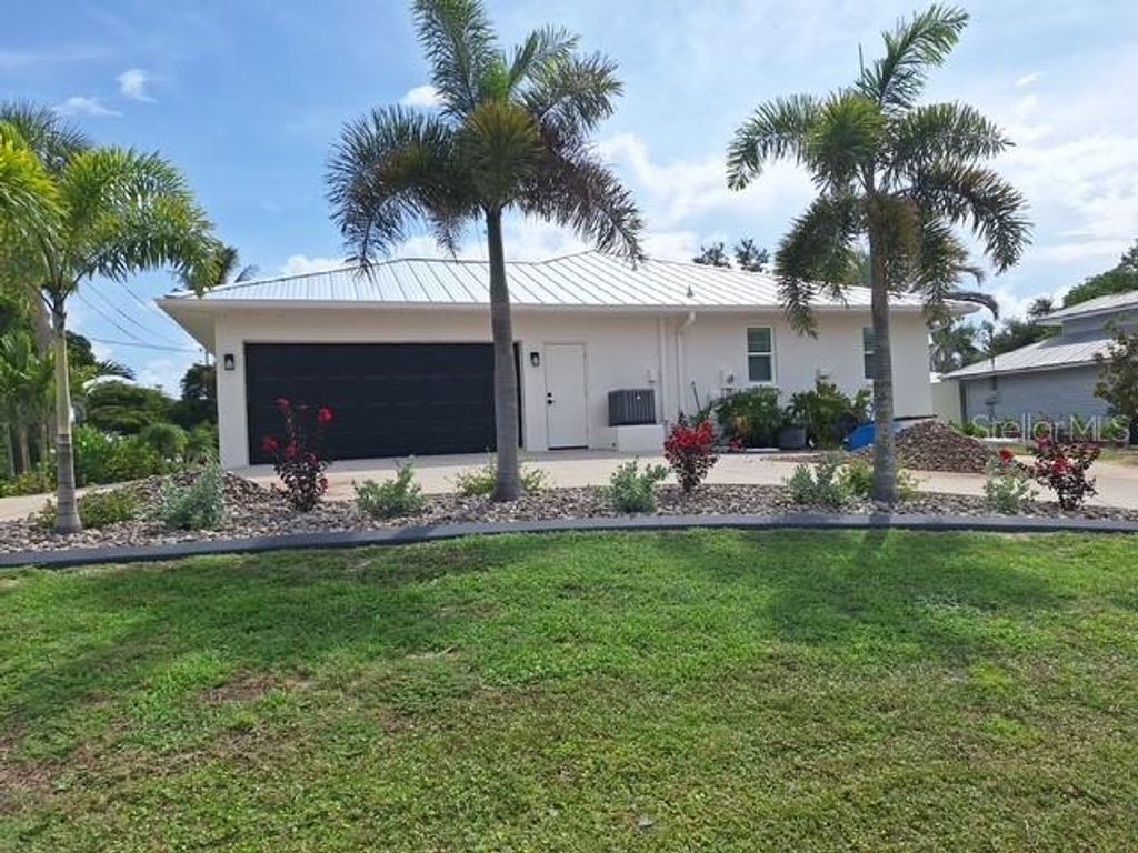 Photo of 808 W Olympia Avenue, Punta Gorda, FL 33950 (MLS # C7512156)