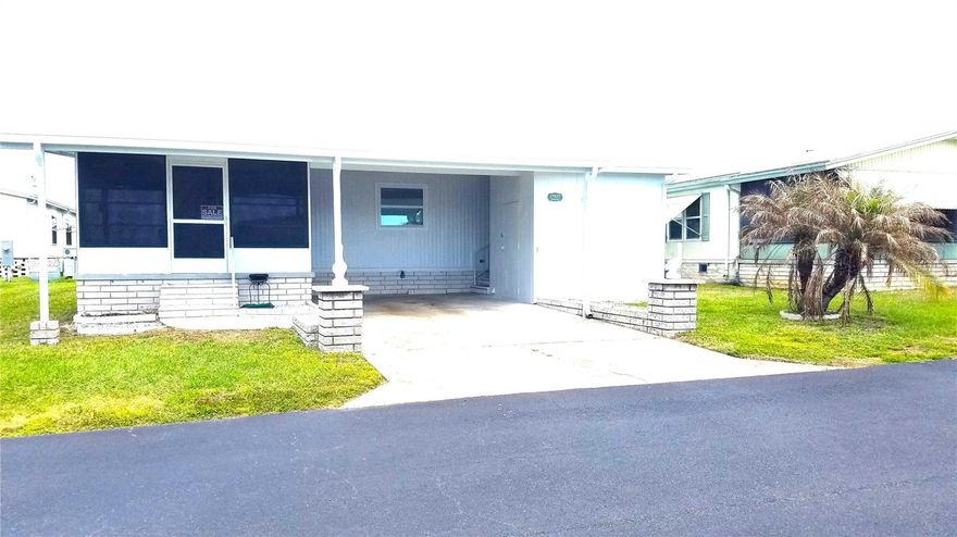 New listing in Spanish Trails West where the HOA is $142 a month, and you get Internet, TV, Lawn Mowed, Heated Pool, Club House and a friendly, busy community.  This 1988 home has 1,008 sq.ft. and updated.  To start, the roof was replaced in 2023, the kitchen has added cabinets, all the appliances are new including a side-by-side refrigerator with a bottom freezer, smooth top stove. dishwasher, and microwave.
The floors are vinyl plank for easy care and waterproof, like new washer & dryer moved inside but hidden behind doors, new insulated windows, and the master bathroom has been done over with a culture marble countertop, plus a redone walk-in shower with a built-in chair.  
You have sliding doors to bring you out from your living room to your front porch that's screened in with vinyl windows to enjoy.

You'll enjoy the community with coffee hours, dances, potluck lunches, Sunday Ice Cream, plus an inside shuffleboard court, Pickell ball, card playing and crafts and bingo and more.  The pool is heated when needed and the club house holds a pool table to enjoy.  Come see what's been done, this may be just what you're looking for at $138,000!