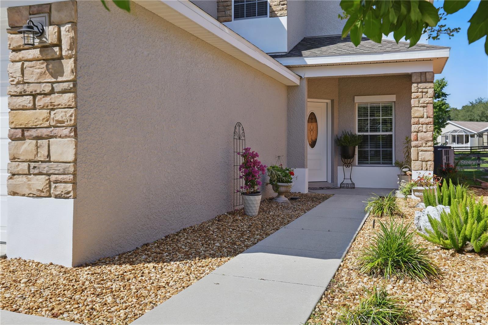 One or more photo(s) has been virtually staged. 5107 NE 122nd Blvd, Oxford, FL – Villages at Parkwood
Welcome to this stunning 4-bedroom, 2.5-bathroom home located in the sought-after Villages at Parkwood, a gated community in Oxford. This home features a 2025 A/C unit, 2024 roof, and 2019 water heater—all major updates completed! Inside, enjoy no carpet, upgraded cabinets, granite countertops, beautiful fans and light fixtures, and plenty of natural light throughout.
The spacious master suite includes a double vanity, garden tub, and separate shower. The guest bathroom also features a double sink, offering comfort and convenience for family and guests alike. Additional highlights include plantation shutters, excellent curb appeal, and a private backyard with a covered porch—ideal for relaxing or entertaining.
The community offers top-notch amenities such as a pool, tennis court, basketball court, and more. Conveniently located near shopping plazas, pharmacies, medical facilities, and everything you need. A family-friendly neighborhood perfect for your next chapter.