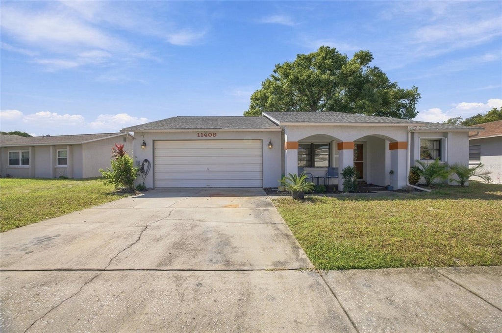 Photo of 11409 Possum Trail, Port Richey, FL 34668 (MLS # TB8561850)