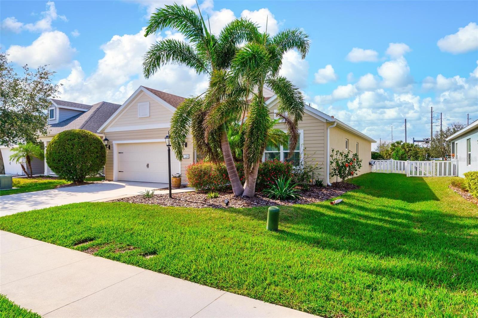This home stands above the rest with a wonderful lakefront lot and fabulous screened in 10x27 lanai with pavers outside the lanai with retractable wall mounted hose reels on exterior. Hurrican shutters and outside security lighting. Lanai has pull down privacy shades (Coolaroo Shades). Outside the lanai to the right paver lanai for grilling and continues along the back of lanai for entertaining. Wonderful large fenced in yard for your pets. Interior is neutral with beautiful choice of cabinetry with crown accents, granite counters, large walk-in pantry, stainless appliances, pull out drawers, Moen faucet, breakfast bar, separate eat in kitchen or dining area. Tray ceilings in living room with brass floor outlet. Large master with two walk-in closets, soft close drawers, wonderful shower and sits at back of house. All the grout throughout the house has recently been cleaned and baths also resealed.
Walking trails throughout the community. NO CDD FEES Fantastic home in a quaint subdivision. Great access to everything. 2 miles north of UTC Mall, Benderson Park, minutes to Fresh Market, Publix fine dining and 1/2 hr to beaches.
