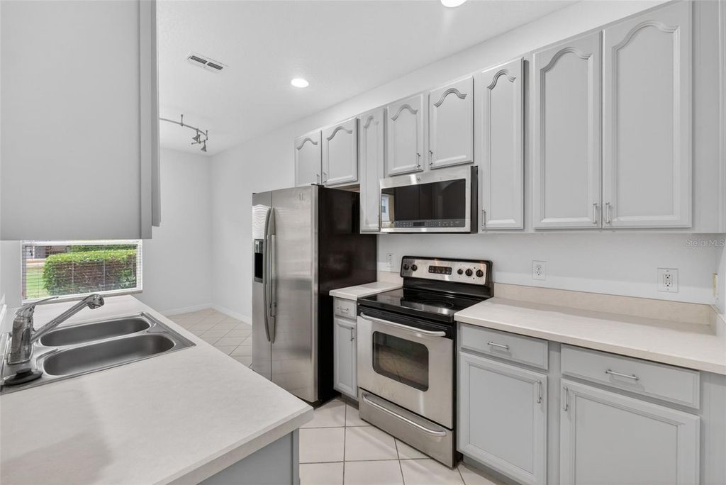 Photo of 721 Fortanini Circle, Ocoee, FL 34761 (MLS # O6398143)