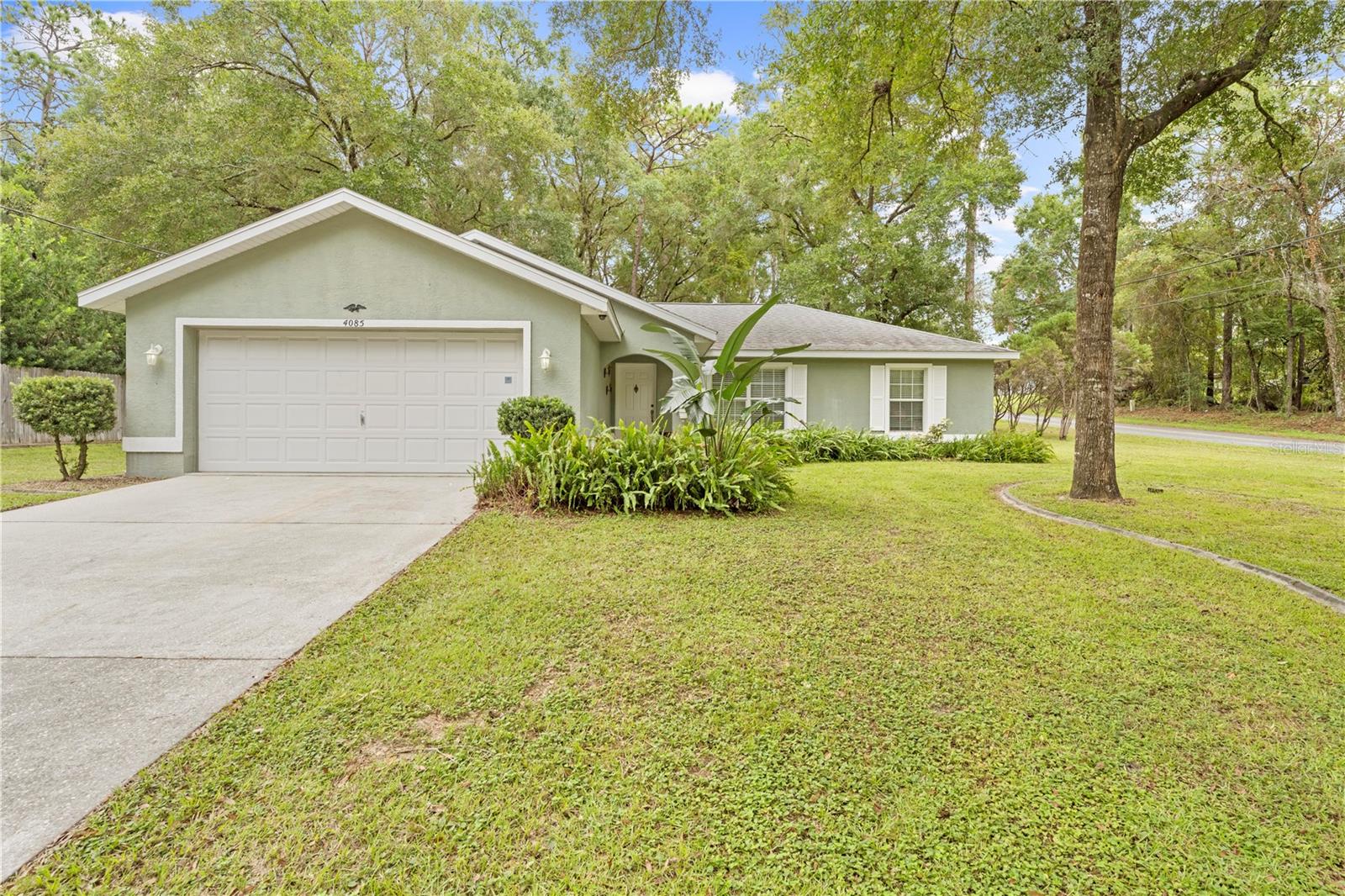 Welcome to this beautifully maintained home in the heart of Inverness, where comfort meets convenience and Florida’s natural charm surrounds you. Step inside to find a bright, inviting floor plan with spacious living and dining areas that flow effortlessly, creating the perfect setting for both everyday living and entertaining. The well-appointed kitchen offers plenty of cabinet storage and counter space, making meal prep a breeze. Bedrooms are generously sized and filled with natural light, offering a cozy retreat at the end of the day. Outside, the property continues to impress with a peaceful yard shaded by mature trees — ideal for relaxing, gardening, or hosting weekend barbecues. A standout feature is the insulated and drywalled storage shed with its own A/C unit, perfect for use as a climate-controlled workshop, hobby space, or secure storage. Located just minutes from downtown Inverness, you’ll enjoy charming shops, local dining, and community events, plus nearby schools and medical facilities. Outdoor enthusiasts will love the proximity to the Withlacoochee State Trail, pristine lakes, and parks, offering endless opportunities for boating, fishing, biking, and nature adventures. Whether you’re a first-time buyer, downsizing, or looking for a peaceful Florida retreat, this property offers style, function, and value in one of Inverness’s most desirable areas. Schedule your private tour today!