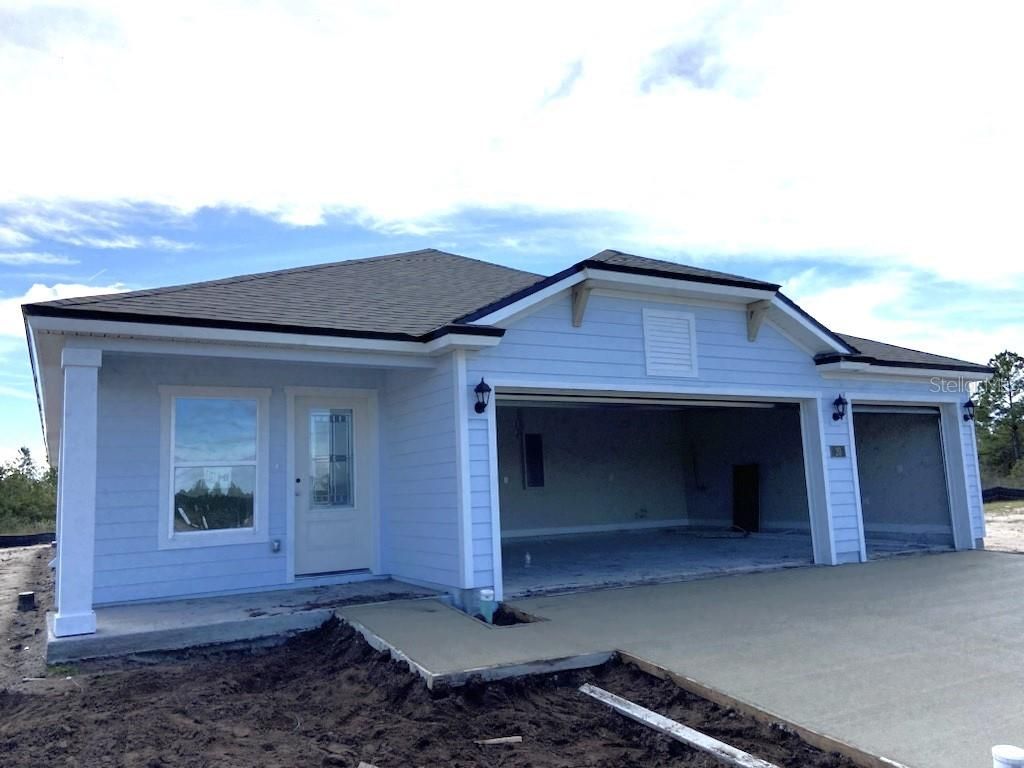 Photo of 20 Sawmill Court, Palm Coast, FL 32137 (MLS # FC294468)