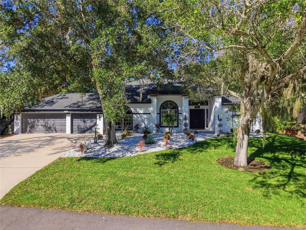 Photo of 1980 Mac Gregor Road, Tarpon Springs, FL 34689 (MLS # TB8554330)