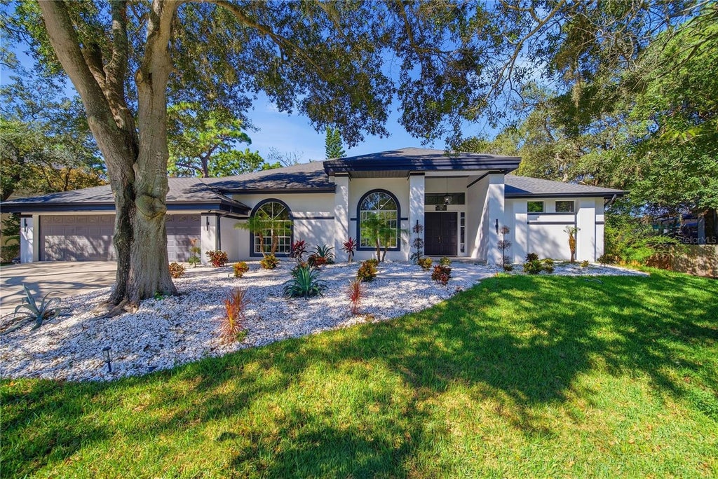 Photo of 1980 Mac Gregor Road, Tarpon Springs, FL 34689 (MLS # TB8554330)