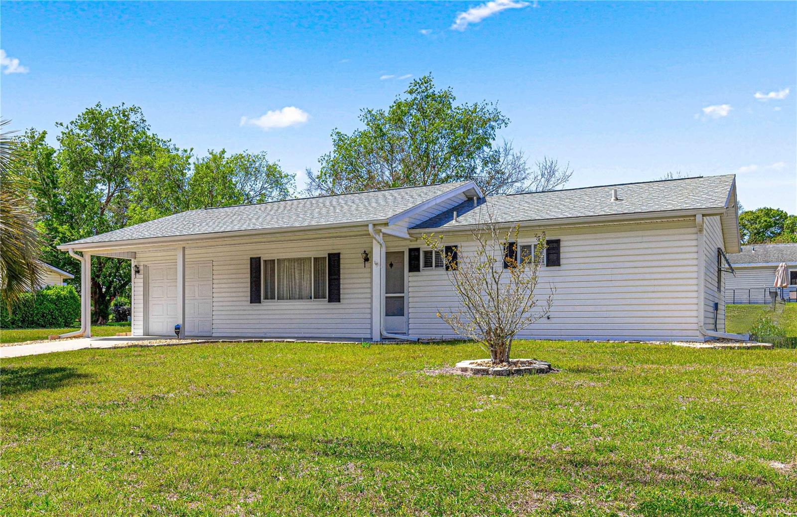 Easy living starts here in Spruce Creek - an active 55+ community! Enjoy a carefree lifestyle in this beautifully maintained 2-bedroom, 2-bath home with fresh updates—including brand-new vinyl plank flooring, stainless steel appliances, and freshly painted interiors that add a crisp, modern touch. The open and airy layout includes a spacious master suite with a large walk-in closet and an en-suite bath with a tub/shower combo. The guest bathroom features a stylish walk-in tile shower, perfect for visitors. Additional upgrades include ceiling fans in every room, updated window blinds, and a durable epoxy-coated garage floor. Relax year-round in the enclosed lanai and enjoy peace of mind with a roof replaced in 2021 and HVAC system upgraded in 2020. Affordable, updated, and truly move-in ready—this home checks all the boxes. Come see why Spruce Creek is Ocala’s best-kept secret. Enjoy low HOA fees that include trash pickup and security patrol. Community amenities: clubhouse, pool, fitness center, library, and billiards. Social activities year-round! Close to shopping, dining, medical, and major roads. Schedule your showing today!
Close