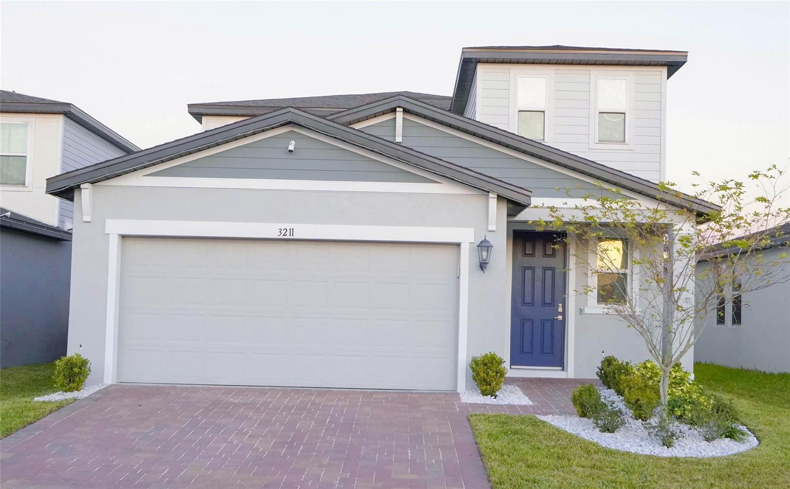 ***This home has a VA Loan with a low 2.875 interest rate that is assumable for qualified veterans only.*** Come fall in love with 3211 Bella Vista Drive and all of its fantastic features! This wonderful energy-efficient 4-bedroom, 2.5-bathroom home is located in the Tuscan Meadows community with low HOA fees, an inviting community pool and playground. Newly built in 2021, this 2,167 SqFt residence offers modern comforts and an open floor plan - perfect for any lifestyle! Everything will have it's place in this kitchen with its spacious 42" wall cabinets, a large island with eating space and a pantry! The granite countertops, a stainless steel appliance suite, and plenty of accent lighting round out the extra features in the kitchen, which is open to the dining and large living room featuring direct access to the fenced backyard. The convenience of a first floor primary suite with an ensuite bath featuring dual sinks, a separate “water closet,” a walk-in shower, large linen closet and a wonderful walk-in-closet make this home even more appealing! In addition to all this you will find an inside laundry area, storage under the stairs, a half-bath, an entry/foyer with two-story ceilings, and a 2-car garage all located on the main level! The second floor of this spacious home features a large loft area with lots of natural light. The loft is a great multi-purpose area and serves as a hub for the additional 3 bedrooms (all with built-in-closets), a second full bath featuring a granite countertop and dual sinks as well as a tub with shower, and a large linen closet! In addition to the fenced-in backyard with patio and shed, the home is beautifully landscaped situated in a peaceful neighborhood with sidewalks and streetlights. This property is centrally located near Disney World, Interstate-4 (offering “easy access” to Orlando and Tampa), Route 192, and other major attractions. Shopping, dining, medical facilities, and top-rated schools are all just minutes away. This move-in-ready home is just waiting for you! Don’t miss the chance to make 3211 Bella Vista Drive your own. Schedule a showing today! (All room measurements are approximate and should be verified by the buyer or their agent if important.)