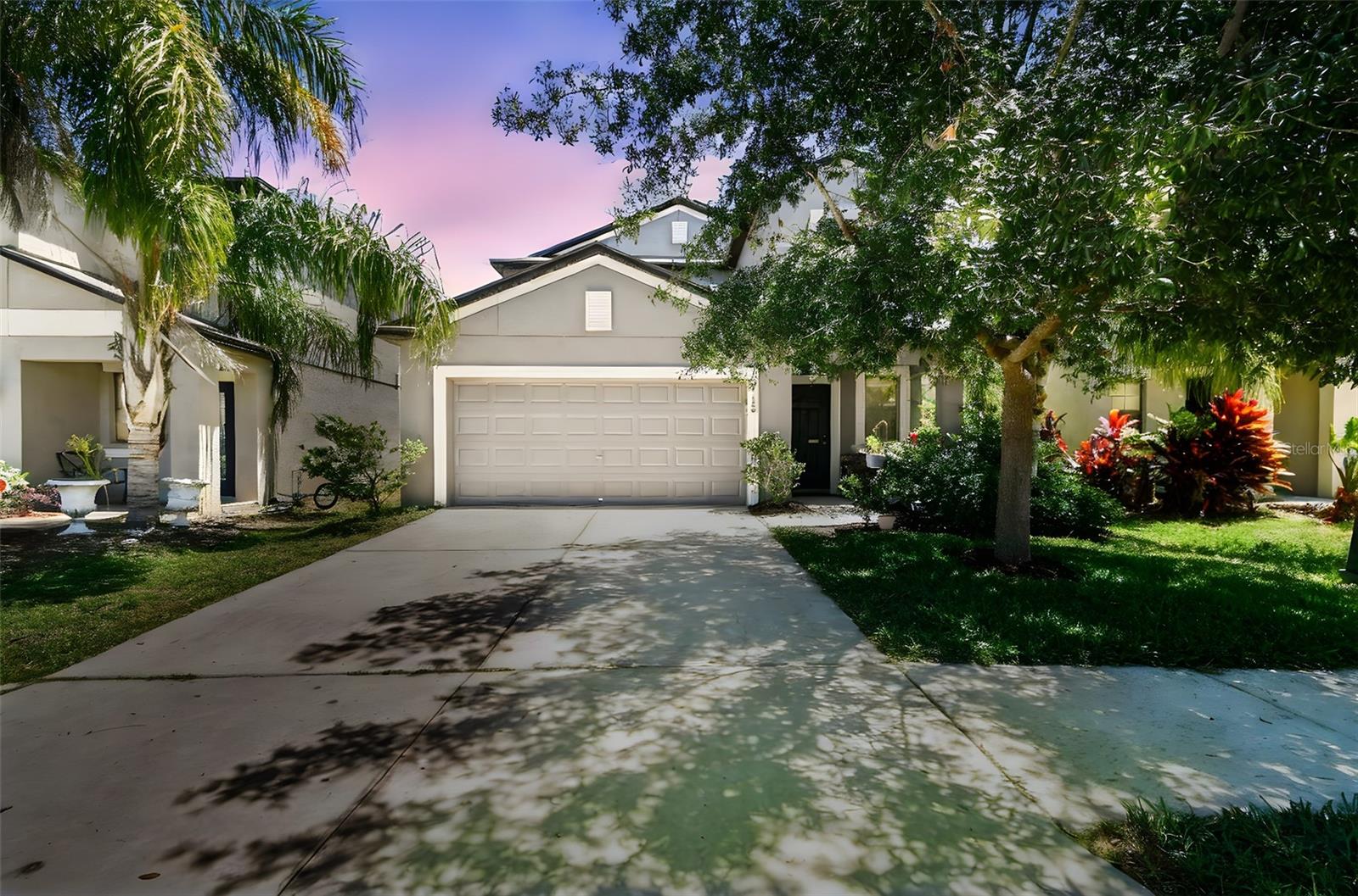 Amazing home centrally located in Riverview! This spacious 5-bedroom, 2.5-bathroom home offers over 2,500 of living space-it's the perfect blend of space, comfort, and functionality. Located in the convenient neighborhood of Twin Creeks community, this two-story residence features an open floor plan ideal for modern living. The heart of the home is a large kitchen with a sizeable island that seamlessly overlooks the dining and living areas—perfect for entertaining or keeping the family connected. The primary suite is conveniently located on the first floor and boasts a private en suite bathroom and a large walk-in closet, offering both privacy and ease of access. Upstairs, you’ll find four generously sized bedrooms and a spacious loft, providing the flexibility for a home office, media room, or play area. The vinyl-fenced backyard offers privacy with no rear neighbors, making it a peaceful retreat for outdoor gatherings or quiet evenings. Additional features include a 2-car garage, energy-efficient paid-off solar panels to help reduce electric bills, and access to the community swimming pool—perfect for enjoying Florida’s sunny weather. Lawn Maintenance is Included!