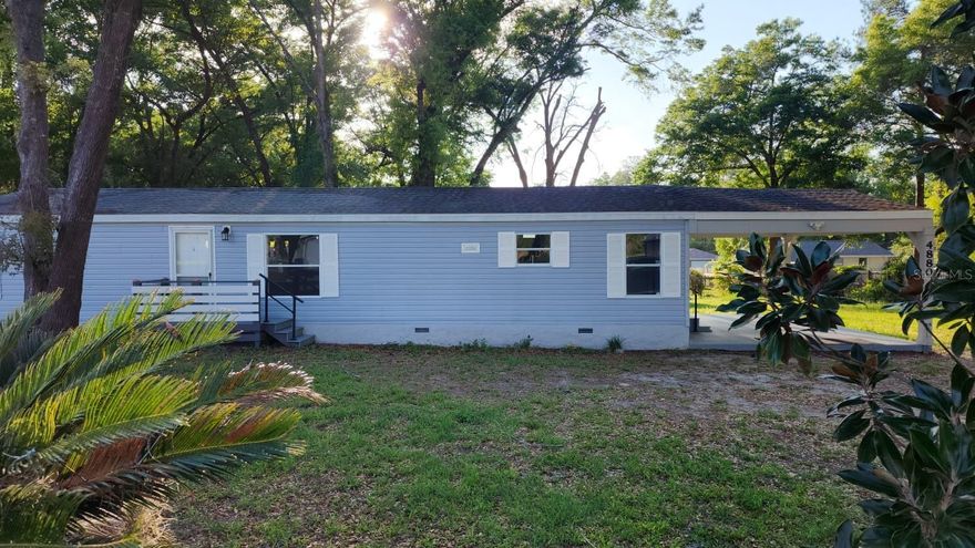 Welcome to your completely remodeled oasis in Ocala! Located just 10 minutes from the prestigious World Equestrian Center, this rare gem offers the perfect blend of modern upgrades, abundant space, and ultimate freedom. Set on a fully fenced, oversized 0.48-acre double lot (150' x 140' / 20,909 sqft), this beautifully updated manufactured home stands out in a quiet, established neighborhood surrounded by traditional single-family homes.

Step inside to discover a pristine, move-in-ready interior featuring 3 spacious bedrooms, 2 full bathrooms, and 1,240 sqft of comfortable, air-conditioned living space. Expand your living and entertaining outdoors on the massive 370 sqft covered porch, bringing the total footprint to 1,610 sqft!

This home has been renovated from top to bottom for your total peace of mind. Major updates include a brand-new well water system and a completely new septic system (featuring all-new PVC piping and holding tank).

Property Highlights:

Ultimate Freedom: Absolutely NO HOA and NO CDD fees! Bring your toys, pets, and work vehicles without the hassle of restrictive community rules.

Peace of Mind: High and dry! Located in a strictly Non-Flood Zone.

Prime Location: Only a 10-minute drive to the Ocala World Equestrian Center, making it a fantastic primary residence or a strategic investment property.

Expansive Lot: A fully fenced double lot offering endless possibilities for outdoor living, gardening, or storage.

You truly have to see it to be delighted with the quality and space this excellent property provides. Schedule your private showing today before it’s gone!