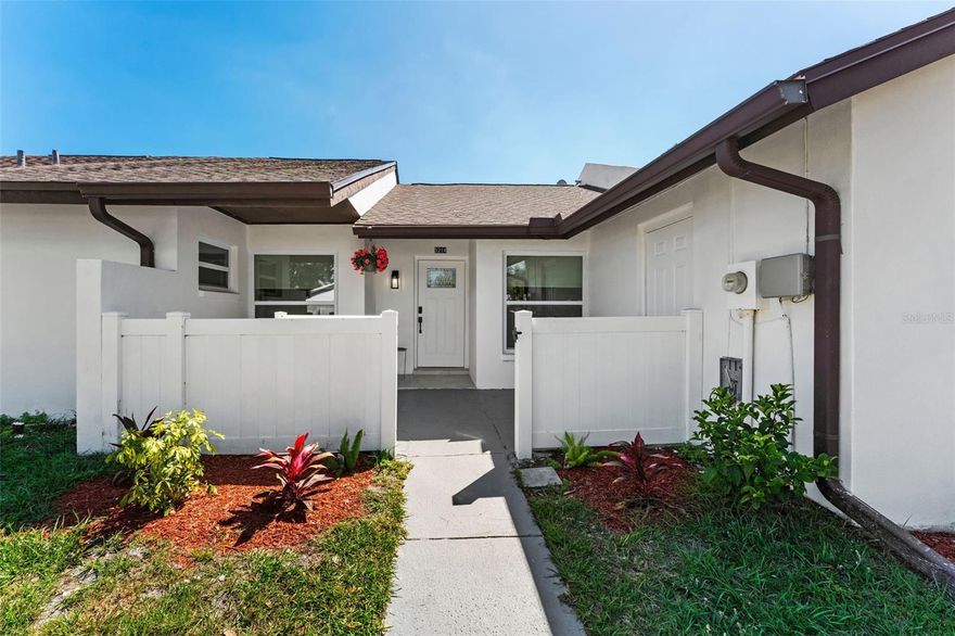 In a world of variables, 5214 Hopedale Drive offers a rare certainty. This block-construction villa has been completely re-imagined for 2026, combining high-end modern aesthetics with the structural peace of mind every Tampa buyer is searching for: No Flood Insurance Required. Welcome to Carrollwood. This 1,260 square foot, three bedroom, two bathroom villa has been remodeled to offer a lifestyle of total ease. The 2026 transformation is absolute. From the fresh exterior facade, new windows/doors and landscaping to the welcoming interior, almost everything was touched. New flooring greets you in a bright, open-concept living space. The kitchen is a combination of utility and style, featuring a full suite of 2025 appliances. Both bathrooms have been elevated with contemporary finishes, ensuring a luxurious feeling for every private moment. Intelligently designed with a split floor plan, each of the three bedrooms are spacious. The primary suite is generously proportioned to accommodate a king size bed and accompanying furniture. Ensuring that comfort is never sacrificed for efficiency. This is the ideal footprint for the professional seeking a streamlined first home or someone looking to downsize their responsibilities while upgrading their quality of life.
With the Veterans Expressway moments away and Tampa International Airport a mere 12-minute drive, this is the premier choice for those with a global perspective. The $83.60 monthly HOA offers a high-performance lifestyle, including access to a community pool, tennis, and basketball courts. Start living in a home that works for you rather than the other way around. Set up your tour today to make this your sanctuary tomorrow!