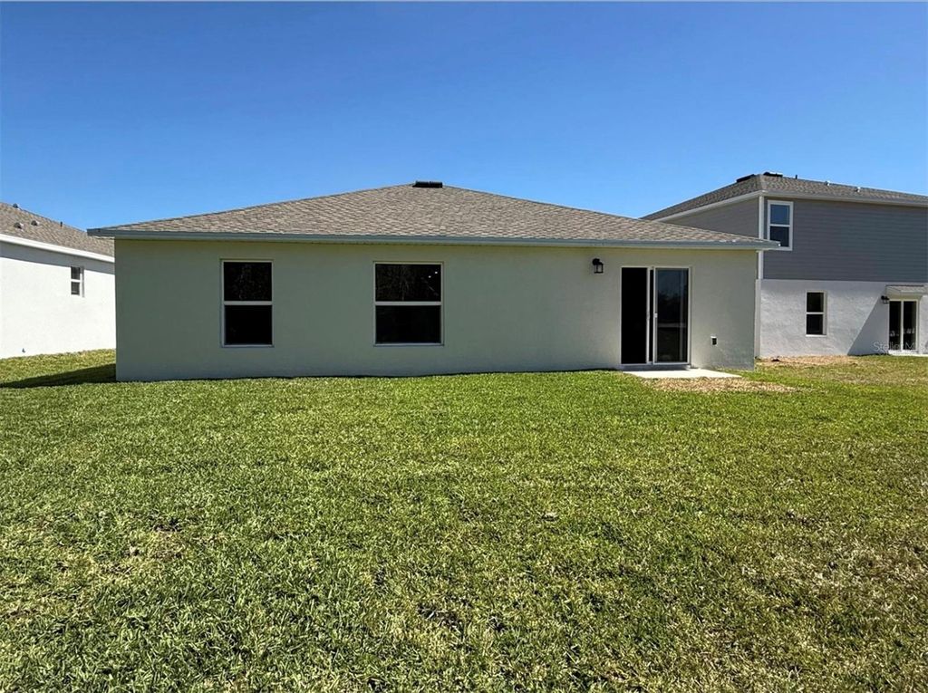 Photo of 5300 Dagenham Drive, Davenport, FL 33837 (MLS # O6404256)
