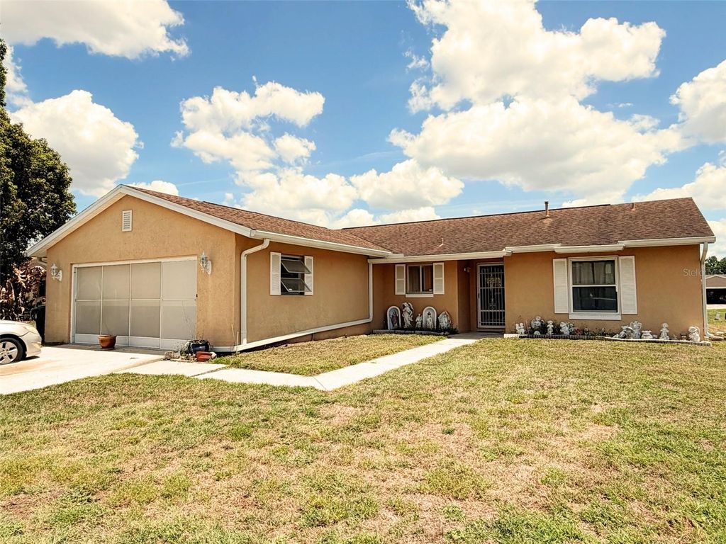 Photo of 10537 Linger Ln, Orlando, FL 32821 (MLS # W7884996)