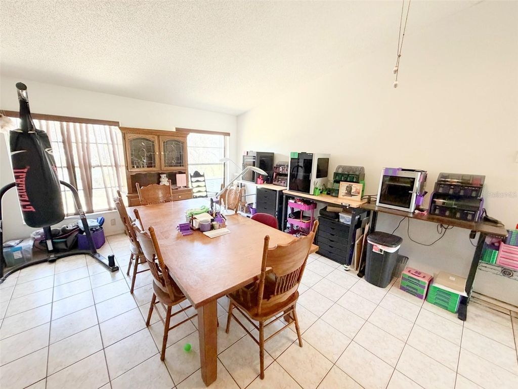 Photo of 10537 Linger Ln, Orlando, FL 32821 (MLS # W7884996)