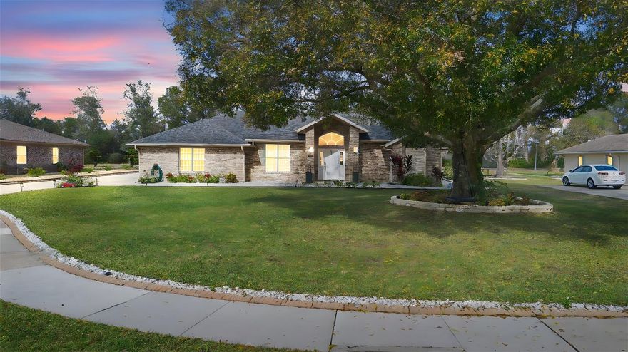 WOW, STUNNING, BEAUTIFUL. Just a few words to describe this home which is set on a generous half-acre homesite tucked away on a quiet cul-de-sac, offering privacy, space, and a serene setting rarely found.
At the heart of the home, a designer kitchen commands attention with custom white cabinetry, premium stainless steel appliances, and an expansive quartz island. Striking pendant lighting, crown-molded ceilings, and rich wood flooring elevate the space, while seamless sightlines connect the kitchen to the open living and dining areas—perfect for hosting gatherings both large and intimate.
The living room is spacious and inviting, anchored by natural light and thoughtful architectural detail. A separate sitting room provides an ideal space for quiet conversation, reading, or a private lounge. There is an impressive screened porch, extending the living area outdoors and overlooking the expansive backyard—ideal for entertaining, relaxing, or future outdoor enhancements.
The primary suite is a true sanctuary, generously sized and thoughtfully designed with a spa-inspired en-suite bath. Dual vanities with marble countertops, illuminated designer mirrors, and a large glass-enclosed walk-in shower deliver a luxurious, resort-style experience. A well-designed walk-in closet completes the retreat.
Additional bedrooms are well-proportioned and privately situated, offering flexibility for guests, family, or home office needs. A permitted storage shed provides valuable additional space for tools, equipment, or hobbies, while the attached garage, dedicated laundry room, and abundant storage add everyday practicality.
Located within a low-cost HOA community, this home offers the perfect balance of neighborhood standards and affordability—allowing you to enjoy the benefits of community living without excessive fees.
With its expansive lot, cul-de-sac location, elegant finishes, and thoughtful design throughout, this exceptional property delivers privacy, luxury, and timeless appeal in one remarkable offering.