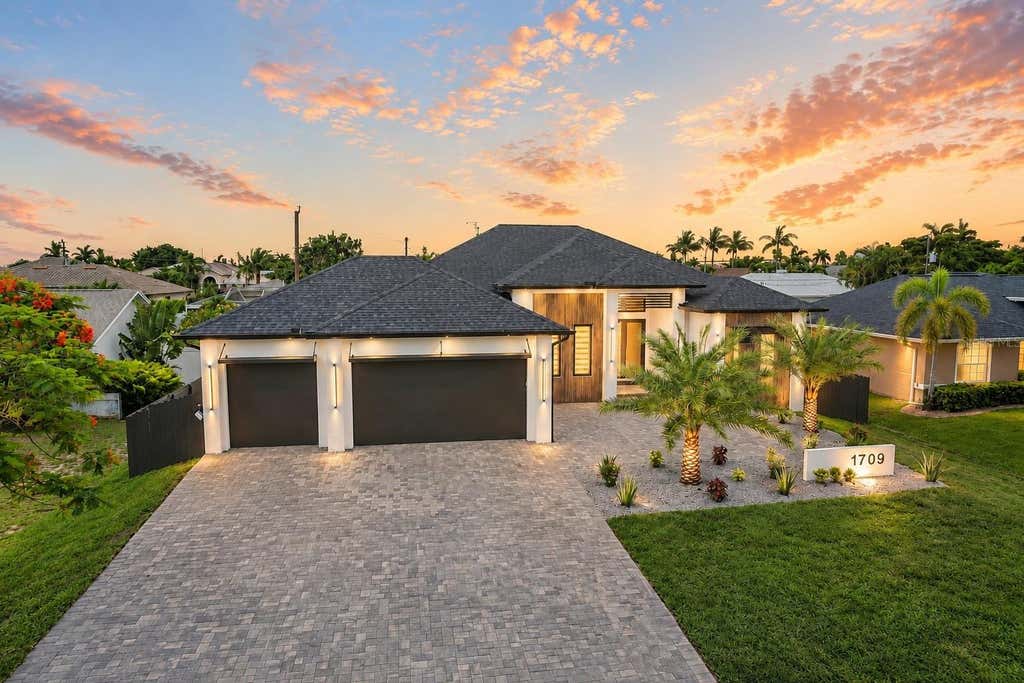 Photo of 1709 SW 43rd Lane, Cape Coral, FL 33914 (MLS # C7527437)