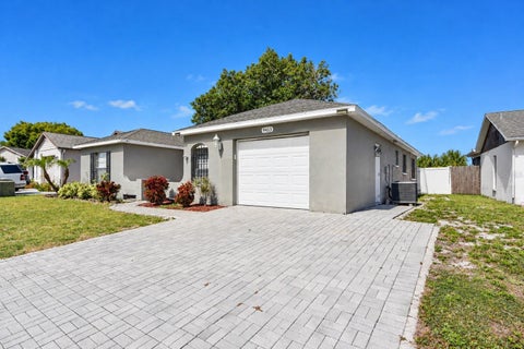 Photo of 9413 Barnstead Lane, Port Richey, FL 34668 (MLS # W7890700)