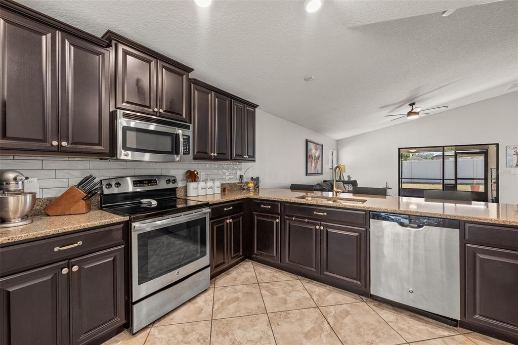 Photo of 14203 Stockwell Lane, Ruskin, FL 33573 (MLS # TB8438614)