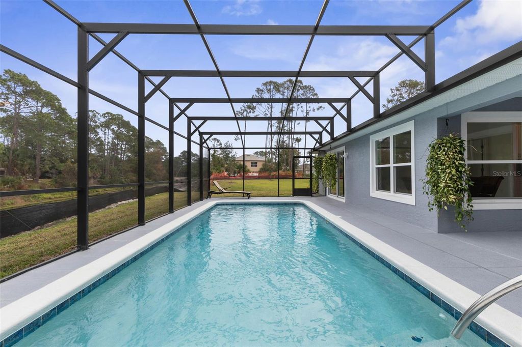 Photo of 11 Randou Place, Palm Coast, FL 32164 (MLS # FC315278)