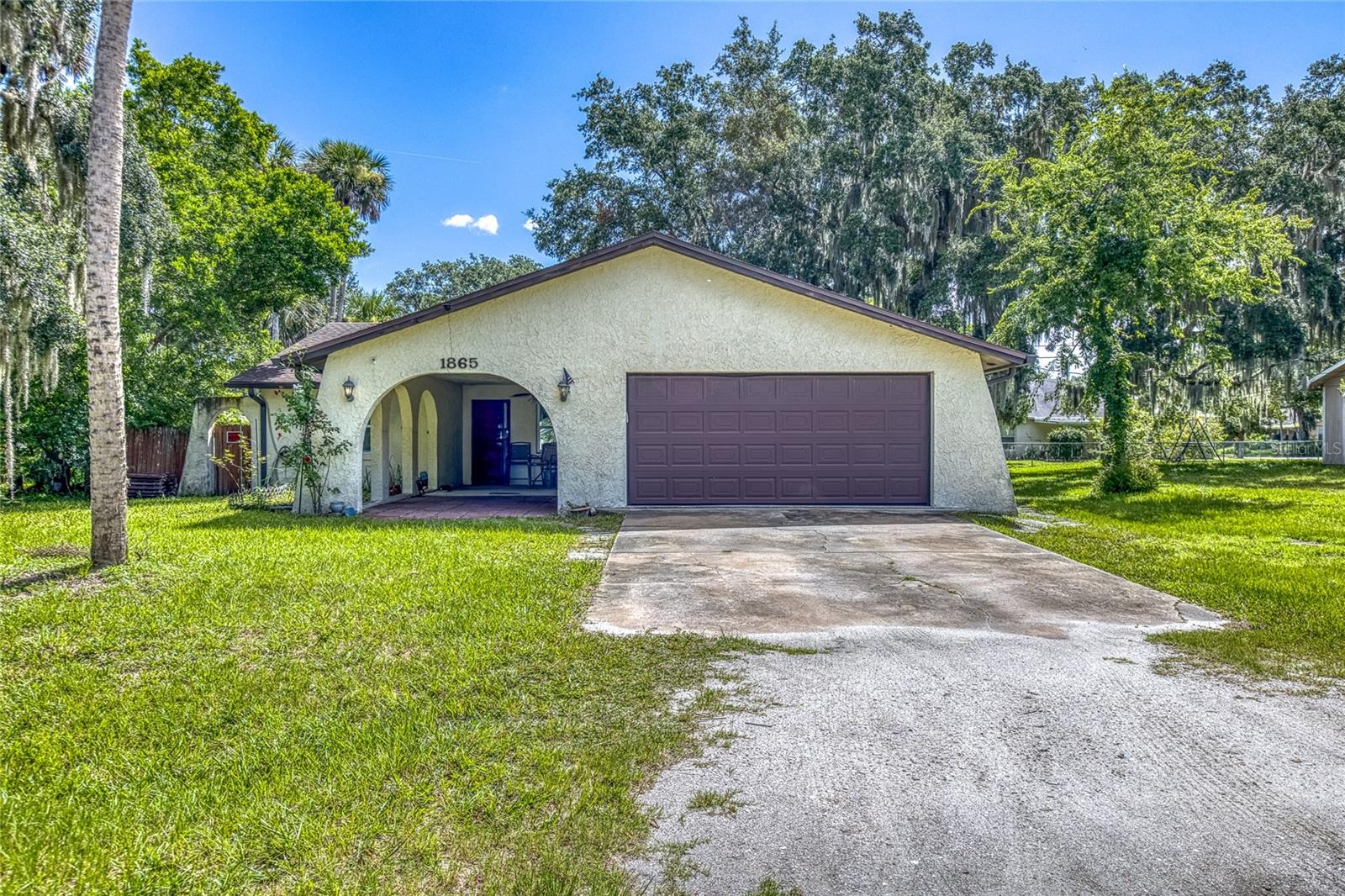 Don’t miss this rare opportunity to own a home in the highly sought-after Edgewater, FL! This charming 3-bedroom, 2-bath home, built in 1978, is tucked away in a quiet, friendly neighborhood just minutes from I-95—perfect for both convenience and peace of mind.
The home features several recent updates, including a powerful 5-ton A/C unit, sleek stainless steel appliances, a $6,000 water softener and purification system, and newer double-pane hurricane-rated windows. The roof is approx 3 years old, offering added peace of mind.
Step outside to a spacious, fully fenced backyard—ideal for pets, entertaining, or simply relaxing. Plus, there’s a detached workshop with electricity, giving you the perfect space for projects, storage, or hobbies.
This one won’t last long!