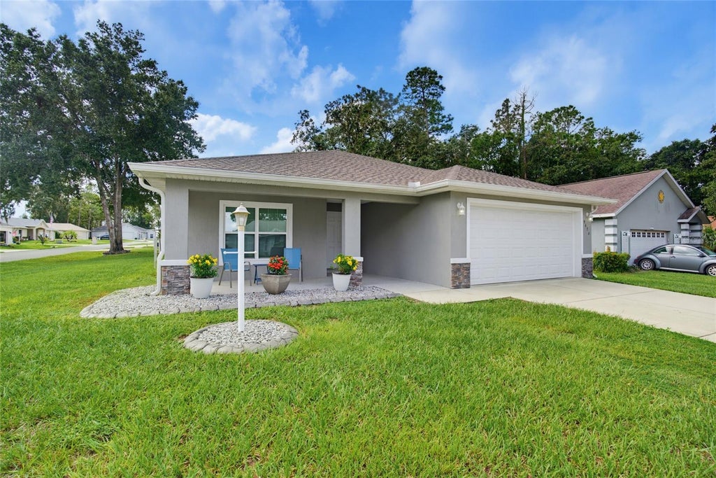 Photo of 9614 SW 53rd Circle, Ocala, FL 34476 (MLS # OM731980)