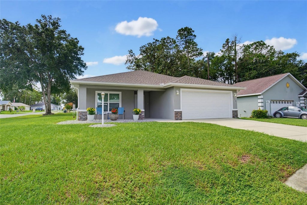 Photo of 9614 SW 53rd Circle, Ocala, FL 34476 (MLS # OM731980)