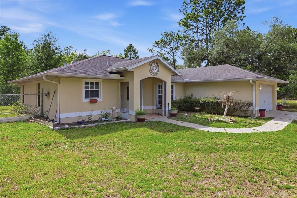 Photo of 7630 N Galt Point, Citrus Springs, FL 34434 (MLS # OM724743)