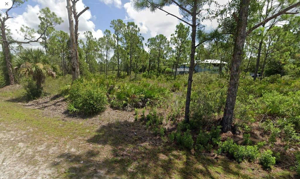 Photo of 12094 Venetian Drive, Punta Gorda, FL 33955 (MLS # TB8413679)