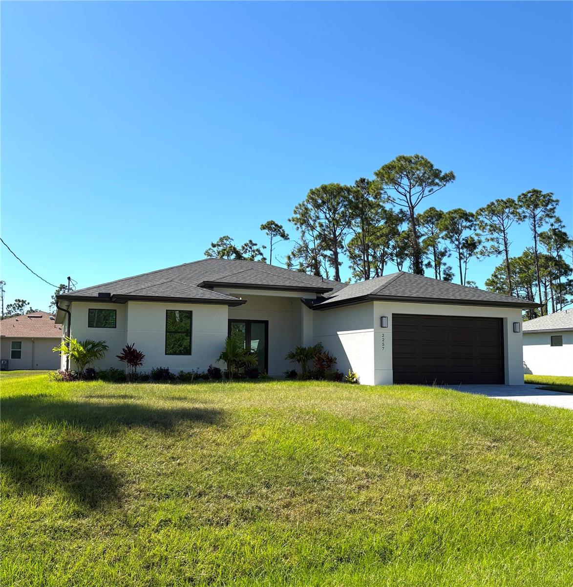 MOVE-IN READY NEW CONSTRUCTION! Be the first to enjoy this modern 3-bedroom + flex/office, 2-bathroom home in a quiet North Port neighborhood. Bright and open with high ceilings, tile floors throughout, hurricane impact windows, and a tiled lanai perfect for entertaining or relaxing outdoors. The sleek kitchen features stainless steel appliances, quartz countertops, and a large center island, ideal for cooking and gatherings. Additional perks include a large backyard, sprinkler system, well & septic (maintenance included) and washer/dryer. No smoking allowed. Just minutes from I-75, US-41, shopping, dining, Wellen Park, CoolToday Park, North Port Aquatic Center, Sarasota Memorial Hospital, and beautiful Gulf Coast beaches under 35 minutes. This brand-new home offers low-maintenance, stylish living in a convenient and peaceful location, perfect for tenants looking for comfort and modern convenience.