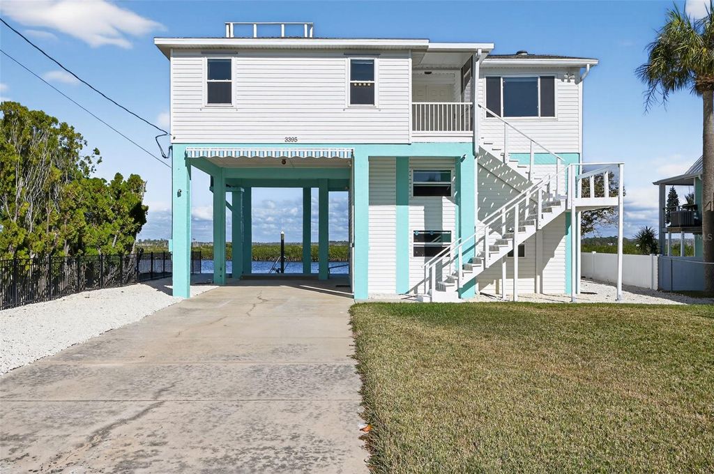 Photo of 3395 Eagle Nest Drive, Hernando Beach, FL 34607 (MLS # TB8472970)