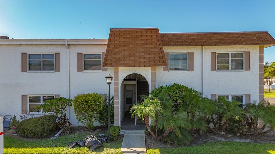 LOCATION...LOCATION! Largest 2 Bedroom in Tradewinds and 30 Day Rental Option! Just Steps from the Beautiful and Scenic Courtney Campbell Causeway Walking & Biking Trail, Where You’ll Enjoy Miles of Beautiful Waterfront Path—Perfect for Morning Runs or Evening Bike Rides. This Ideal Location Also Puts You Less Than 2 Miles from Downtown Safety Harbor and All It Offers, Where You Can Explore Local Restaurants and Boutiques, Easily Enjoy Community Events, or Unwind At the Beautiful Safety Harbor Resort and Spa. You’re also a Short Drive to Clearwater Beach and Top-rated Gulf beaches, 12 Miles to Tampa International Airport, and Just 5 Miles to St. Pete–Clearwater Airport. With Entrances to the Community from Both McMullen Booth and Bayside Blvd, Access is Easy to Major Highways, Shopping and Entertainment Destinations....Located in the Desired Tradewinds Community, This Spacious 2 Bedroom, 1 Bathroom 2nd Floor End Unit Condo Has a Wonderful, Open Floorplan, Filled with Natural Light. The Kitchen Has Been Updated and Includes all Appliances, Granite Counters, Cherry Wood Cabinet Doors, Breakfast Bar Overhang for Barstools, and Beautiful Backsplash. The Living Room and Bedrooms have Newer Flooring.  The Primary Bedroom Has a Large Walk-In Closet and Separate Dressing/Vanity Area.  You'll Also Enjoy the Large Screened Balcony and Extra Storage Room. With a Flexible 30-day Rental Policy, This Condo is Perfect for Full-Time Living, a Seasonal Retreat, or Investment Property. The Well-Maintained Community Offers a Pool, Clubhouse, and Beautifully Landscaped Grounds. This 2nd Floor Condo Sustained No Hurricane/Storm Damage and is Ready For a Quick Closing!