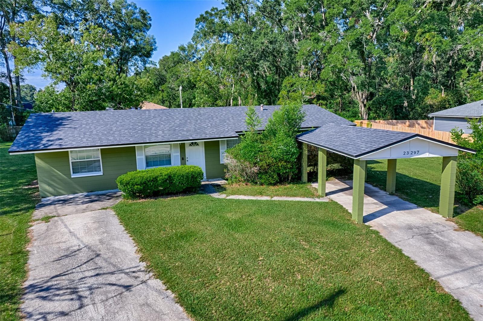 Welcome to 23297 NW 178th Place, High Springs, FL 32643!
This solid concrete block home offers 3 bedrooms, 1 bathroom, and sits on a spacious 0.59-acre lot with no HOA and no flood zone, giving you both freedom and peace of mind. Inside, you’ll find an updated kitchen featuring granite countertops, new appliances, and modern finishes. Durable LVP flooring flows throughout, and a versatile bonus flex room provides the perfect space for a home office, playroom, or additional living area.
The home also features an indoor laundry room, a one-car carport, and key updates including a newer roof (2021), AC (2015), and a brand-new water heater (2024). Outside, enjoy the large backyard with a brand-new storage shed, perfect for tools, hobbies, or extra storage.
Beyond the home, this property offers an unmatched lifestyle. High Springs is surrounded by some of Florida’s most famous natural treasures, including Poe Springs Park (˜3 miles), Gilchrist Blue Springs State Park, Ginnie Springs, and nearby O’Leno and River Rise Preserve State Parks—all offering swimming, tubing, hiking, and year-round outdoor adventures. When you’re ready for a day in town, the charming downtown High Springs is just minutes away, with unique antique shops, local boutiques, breweries, and restaurants to explore.
This property blends comfort, updates, and a prime location—making it a perfect place to call home in beautiful High Springs.