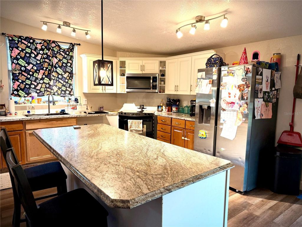 Photo of 685 Eagle Watch Road, Oak Hill, FL 32759 (MLS # NS1086977)