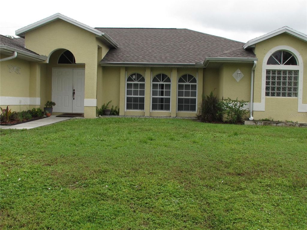 Photo of 1550 Abalom Street, Port Charlotte, FL 33980 (MLS # C7516214)