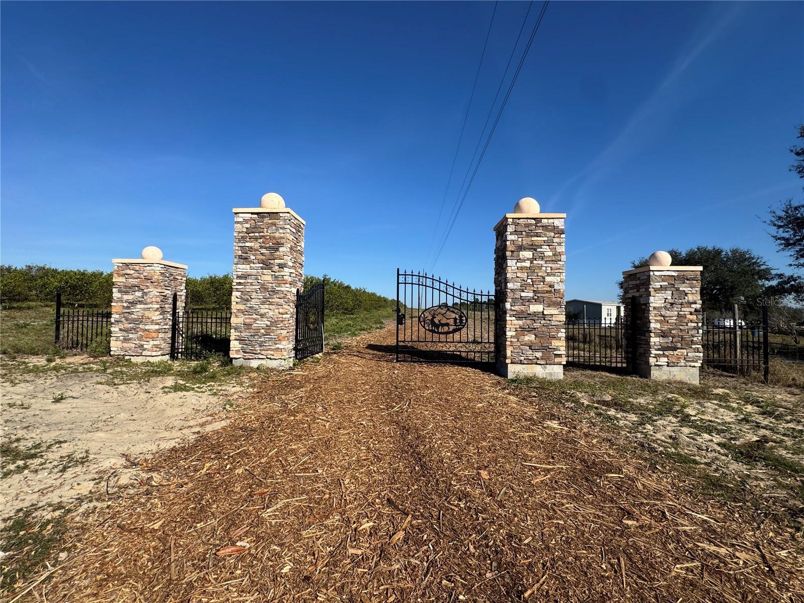 Incredible opportunity to own 20 acres of prime land, currently being subdivided into quarter-acre lots! A private gate is already built, and a new road is underway for easy access. This property is adjacent to the approved Whispering Hills development, which includes hotels, golf courses, single-family homes, and more, making it a fantastic investment opportunity or the perfect place to build your dream home.
Enjoy breathtaking views of the rolling hills, NO HOA, and the freedom to bring your horses. Conveniently located just minutes from the Florida Turnpike, with easy access to Orlando, Ocala, The Villages, Groveland, Minneola, and Clermont.
Reserve your homesite now—this is a must-see!