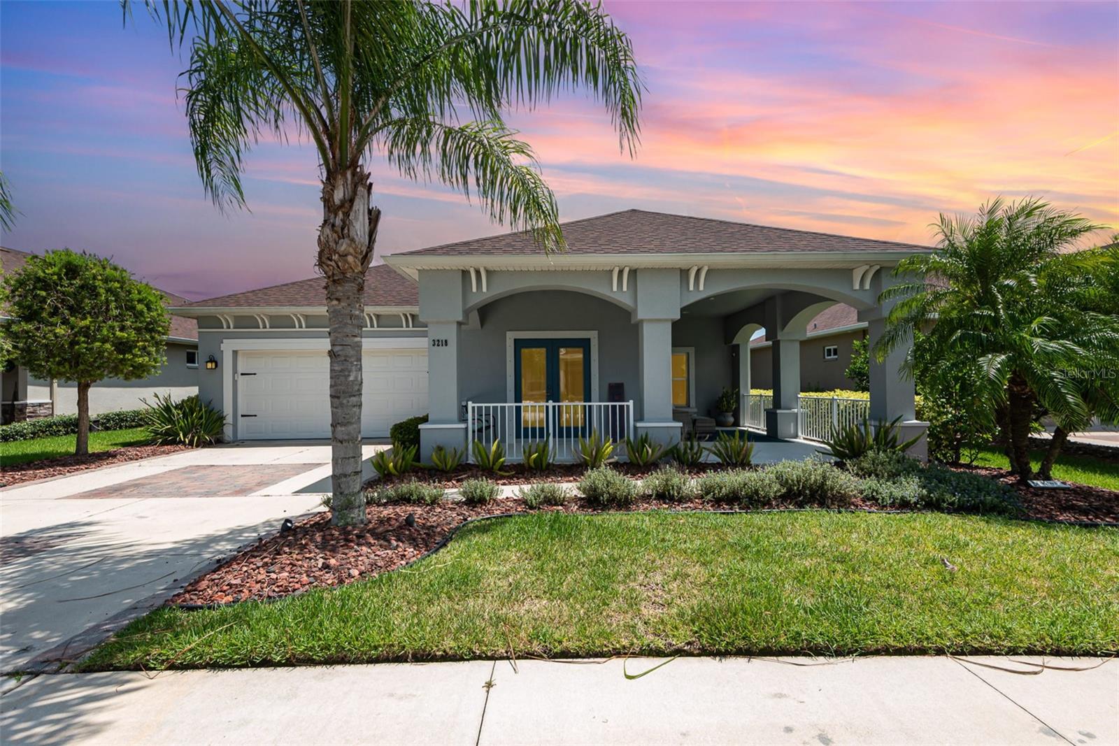 Immaculate lakefront retreat with designer upgrades and peaceful wooded surroundings! This move-in-ready 3-bedroom, 2-bath home includes an office/flex room that can function as a 4th bedroom. Located on a premium lot with direct views of a lighted pond fountain, it offers hurricane shutters, a generator transfer switch, and a low HOA. The gourmet kitchen features a gas range, oversized island, granite countertops, upgraded cabinets, built-in wine cooler, and coffered ceiling. Interior highlights include 8' doors, upgraded tile baths, automatic blinds, & an open layout. The primary suite boasts a walk-in closet and spa-like en-suite bath. Enjoy the large front porch with ceiling fans or unwind in the lush backyard setting. Located in Verano at Venetian Bay, a golf course community with a pool, tiki bar, fitness center, playground, miles of trails, and a vibrant town center with a bistro, coffee shop, and more. A perfect blend of luxury, flexibility, and resort-style living in NSB.