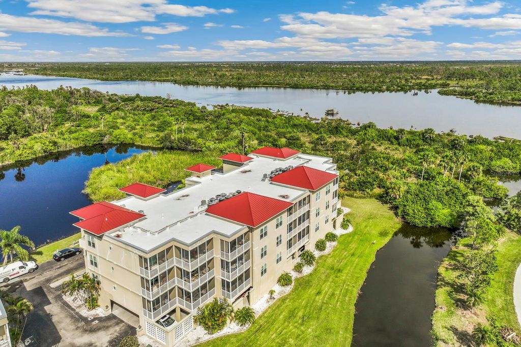 Photo of 10055 Links Lane #206, Rotonda West, FL 33947 (MLS # D6144106)
